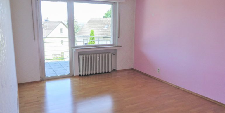 Schlafzimmer mit Balkonzugang