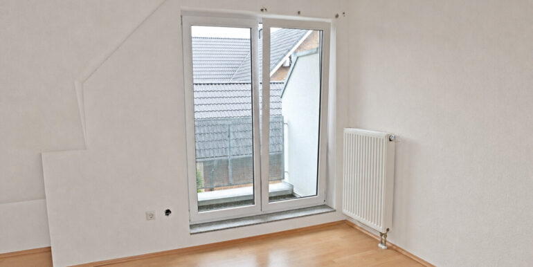 Schlafzimmer I mit Balkon
